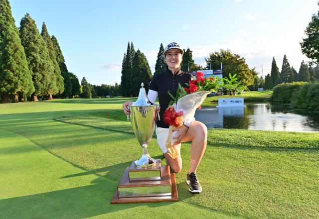 Golf Winner with Trophy