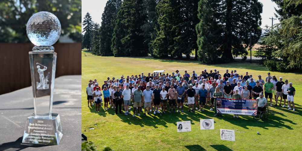 award trophy and large group photo from golf tournament