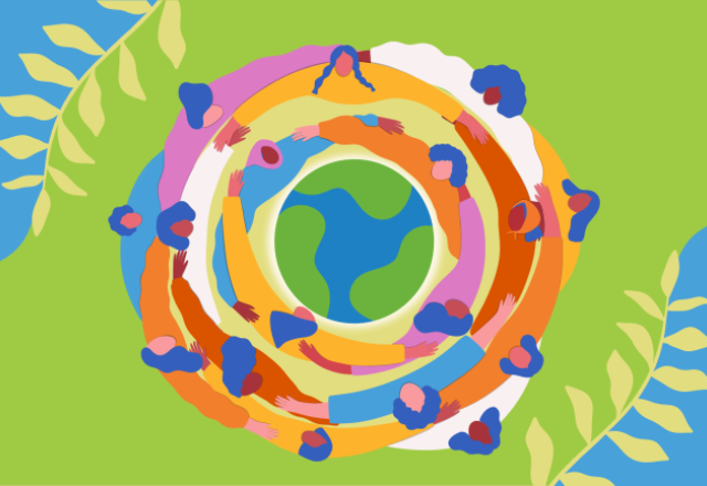 Colorful circle of women embracing around a globe